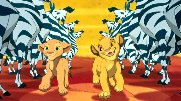 Nala und Simba laufen als Zeichentrickfiguren durch Zebras.